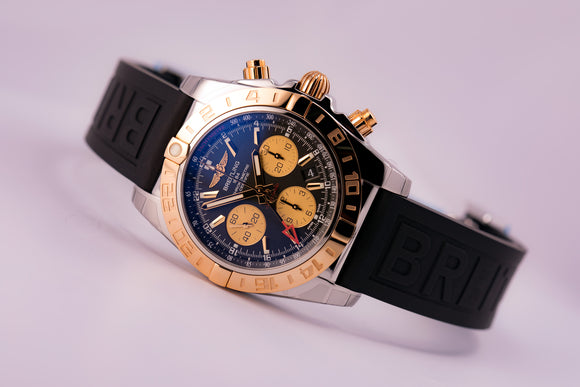 Breitling Chronomat 44 GMT 18kt gold/SS Black Dial, Ref. CB042012|BB86 on Diver Pro III Strap with Micro Adjustment Folding Buckle - The Luxury Well